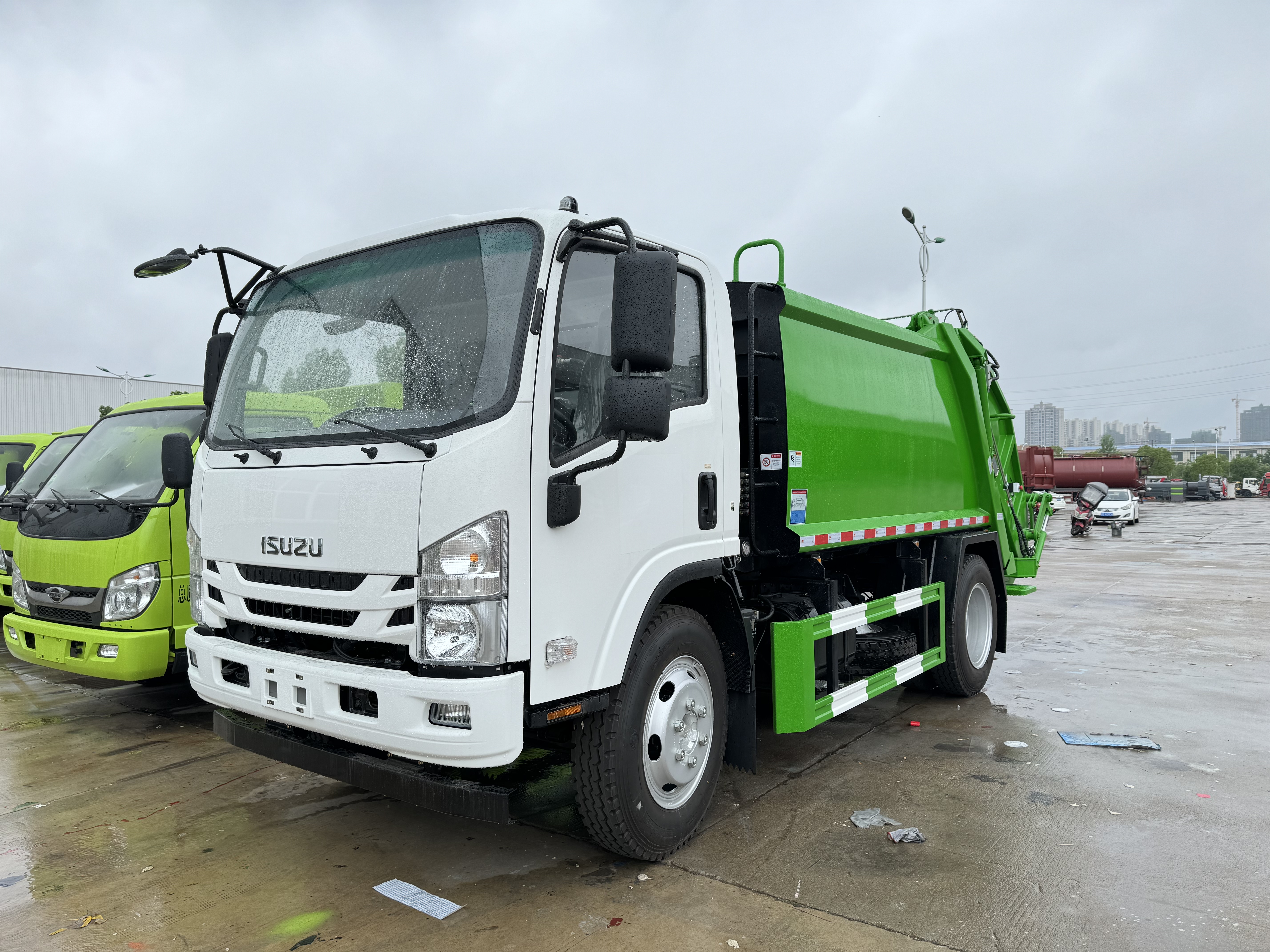 QingLing ISUZU 700P 6M3 Compressed Garbage TRUCK 4x2 QLQL1110ANHAY 